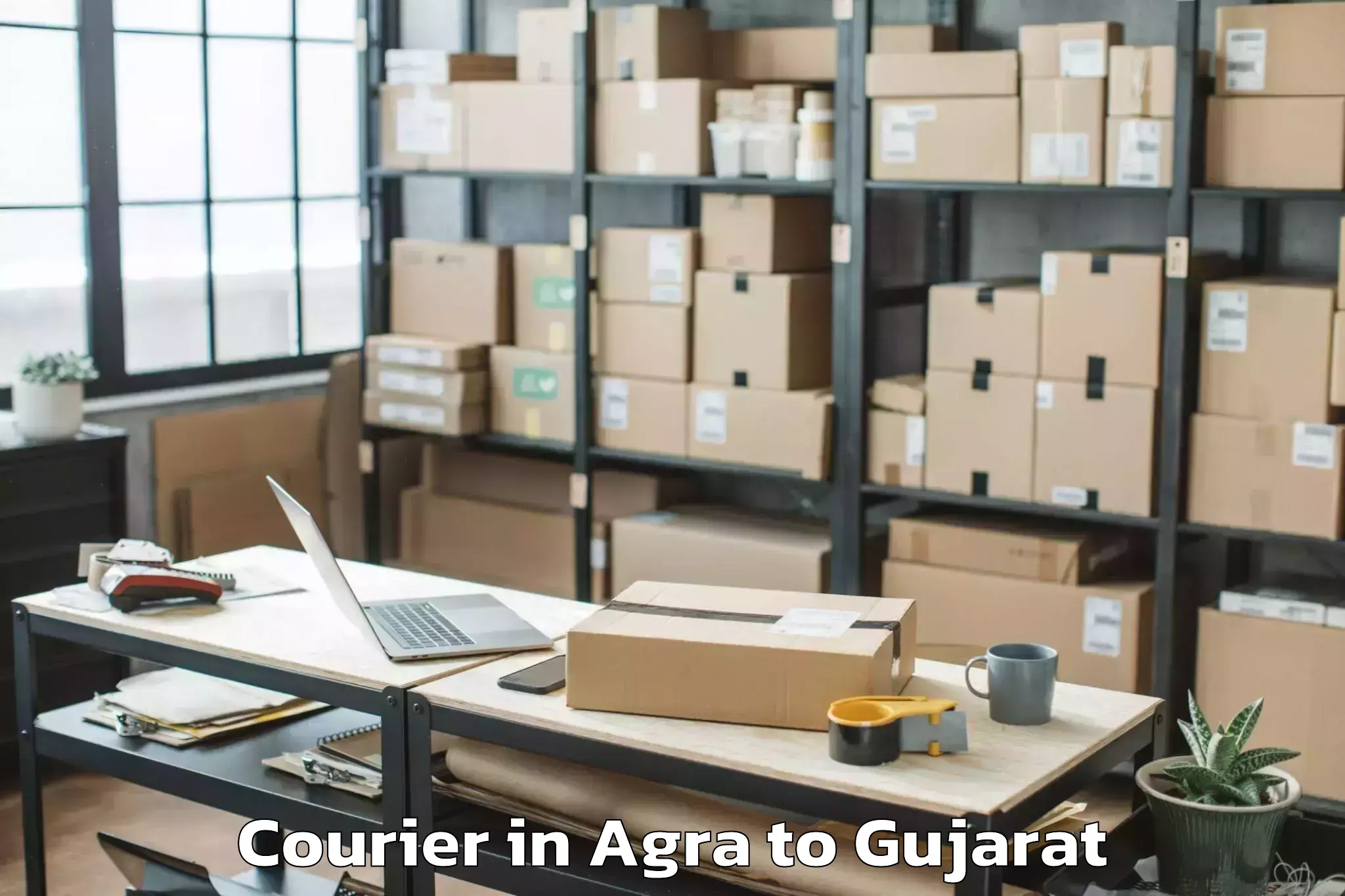 Book Agra to Madhav Kampo Courier Online